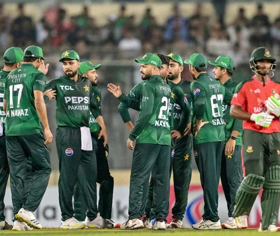 pakistan s players celebrate as bangladesh s tanzid hasan r walks back to the pavilion after his dismissal during the first twenty20 international cricket match between bangladesh and pakistan at the sher e bangla national cricket stadium in dhaka on july 20 photo afp
