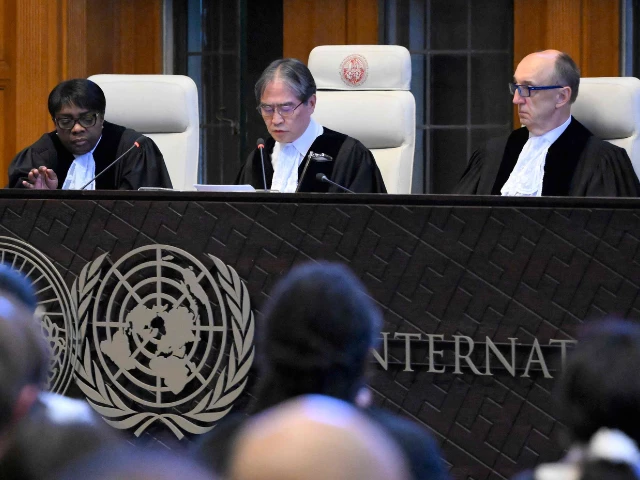 president of the international court of justice icj yuji iwasawa c and members issue first advisory opinion ao on states legal obligations to address climate change in the hague on july 23 2025 photo afp
