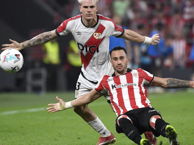 rayo vallecano s pep chavarria and athletic bilbao s alex berenguer r in la liga action in bilbao