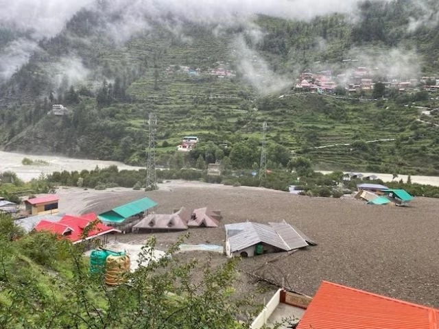 houses are partially buried by a mudslide amid flash floods in dharali uttarakhand india august 5 2025 photo reuters