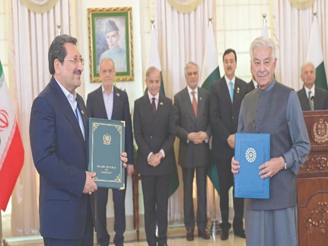 prime minister shehbaz sharif iranian president dr massud pezeshkian and other dignitaries witness the signing ceremony of various mous and agreements between the two countries photo express