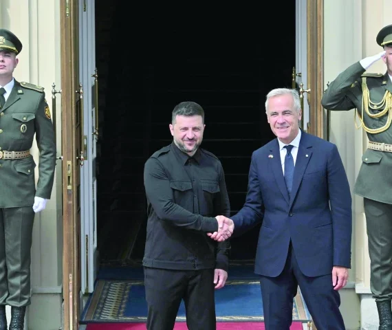 ukrainian president volodymyr zelensky shakes hands prime minister of canada mark carney during their meeting prior the talks in kyiv photo afp