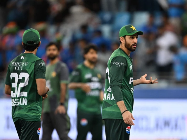 pakistan s captain salman agha r reacts at the end of the asia cup 2025 twenty20 international cricket match against india at the dubai international stadium in dubai on september 14 2025 photo afp