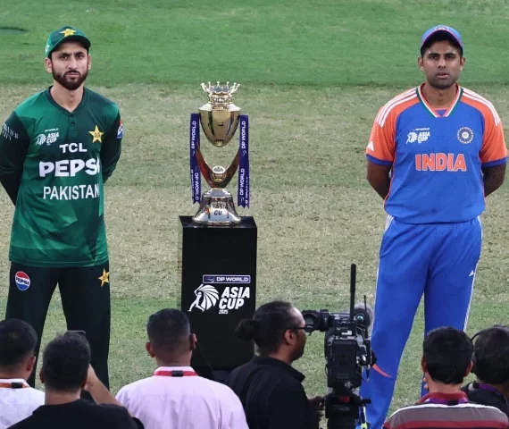 india s captain suryakumar yadav r and his pakistani counterpart salman agha stand on the field for the toss before the start of the asia cup 2025 final at the dubai international stadium on september 28 photo afp