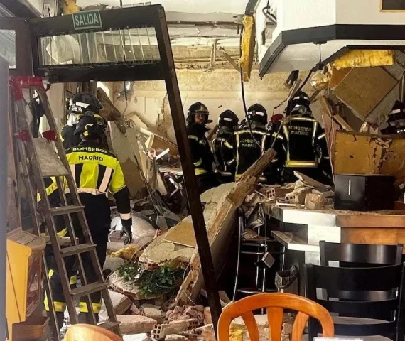 firefighters work at the site after an explosion in a cafe injured at least 21 people three of them seriously according to emergency services in madrid spain september 13 2025 photo reuters