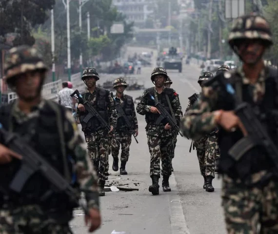 nepali army soldiers patrol at the road near the singha durbar office complex that houses the prime minister s office and other ministries following protests against monday s killing of 19 people after anti corruption protests triggered by a social media ban which was later lifted in kathmandu nepal september 10 2025 photo reuters