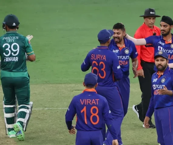 avesh khan celebrates with teammates after dismissing fakhar zaman during the asia cup 2022 photo afp
