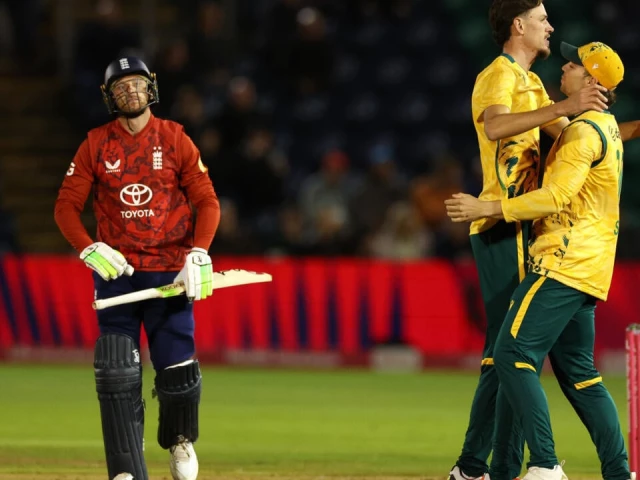 england s jos buttler l leaves the field after being dismissed by marco jansen c in the 1st t20 against south africa at sophia gardens cardiff photo afp