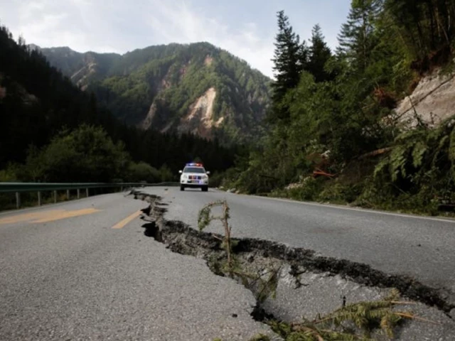 a file photo of a crack running through a mountain road after an earthquake photo reuters