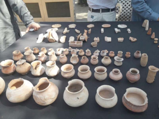 artifacts excavated at the chanhu daro archaeological site are put on display photo express