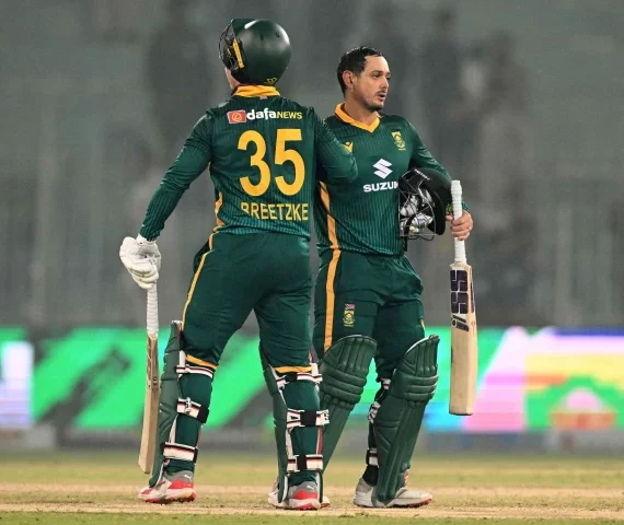 south africa s quinton de kock r celebrates with south africa s captain matthew breetzke l at the end of the second odi against pakistan at the iqbal stadium in faisalabad on november 6 photo afp