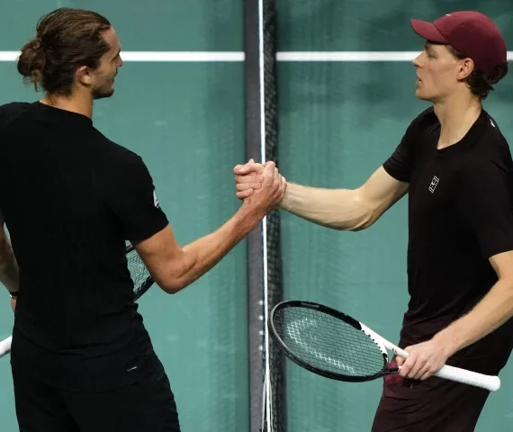 jannik sinner shakes hands with alexander zverev l after winning the paris atp masters 1000 semifinal photo afp